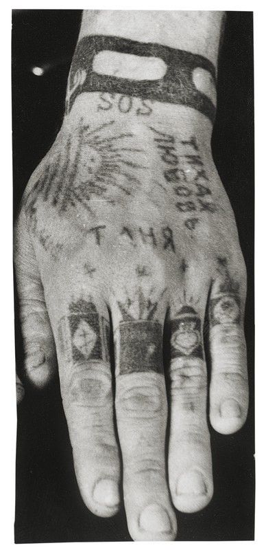 Translating the Secret Meanings of Soviet Prison Tattoos | <<——  The imagery of trapped insects suggested that the prisoner was ‘mixed up in drugs like a beetle in manure and [will] never get out.’ Prison Tattoo Meanings, Mob Tattoo, Russian Prison Tattoos, Police File, Gang Tattoos, Russian Tattoo, Prison Tattoos, Omerta Tattoo, Spider Tattoo