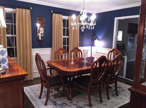 Blue Brown Dining Room, Dining Room Blue Paint, Royal Blue Dining Room, Room Paneling, Dark Blue Dining Room, Dining Room Paneling, Royal Blue Walls, Blue Dining Room, Cherry Wood Furniture