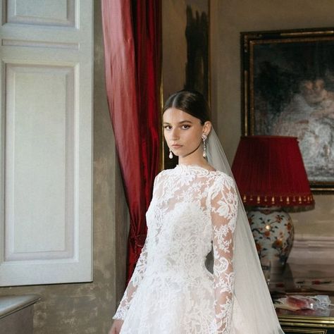 Vogue Weddings on Instagram: "“I was named after Grace Kelly and my entire life I dreamt of wearing her wedding dress. She was a literal princess. I knew I wanted long lace sleeves and to replicate her dress as close as possible," shares bride Grace Kennedy. With only six months to go until the wedding day, she made an appointment at @moniquelhuillier and tried on a few dresses. Eventually, she found one that took her breath away. “I asked to try it with the matching bolero and that was it,” she says. “That was my dress. The only thing I wanted differently was the back to be changed from a keyhole to a V shape. They made my perfect dress, I paired it with @MiuMiu shoes, and I lived the dream.”  For groom Hayden, the tuxedo was always going to be @TomFord. “I just think he does the quintess Long Sleeve Boat Neck Wedding Dress, Boat Neck Long Sleeve Wedding Dress, Grace Kelly Wedding Dress Inspired, Bolero Wedding Dress, Wedding Gown Lace Sleeves, Keyhole Wedding Dress, Lace Bolero Wedding, Grace Kelly Dresses, Miumiu Shoes