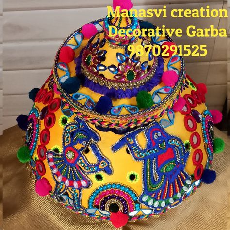 Exclusive work by Manasvi Creation Navratri special Decorative Garba Work Only Pre booking DM for more details. Manoj patel-9870291525 Jyoti patel-9773727317 Follow my page #manasvicreations #traditionalgarba #garba #decorativegarba #garbawork #handmade #diygarba #navratri #navratrigarba #theamgarba #designergarba #exclusiveart #decorativeart #customize #decoration #ecofreindly #ghatkopargarba #jayambe #jaybhavani #localforvocal Navratri Matki Decoration, Garba Matki Decoration, Garbo Decoration Navratri, Garba Decoration Ideas Navratri, Garba Decoration Ideas At Home, Navaratri Decoration, Garba Decor, Indian Handicrafts Decor, Matki Decoration