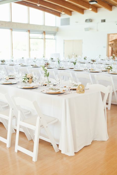 White Chairs Wedding, Family Style Reception, White Wedding Table Setting, Family Style Weddings, Wedding Reception Chairs, Gold And White Wedding, Chairs Wedding, Wedding Table Setup, White Folding Chairs