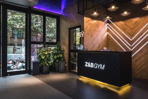 Z&B GYM CHANGLE RD on Behance Gym Counter Design, Spin Studio Design Ideas, Gym Entrance Design, Gym Reception Design, Gym Front Desk, Modern Gym Design, Boutique Gym Design, Gym Reception, Gym Architecture