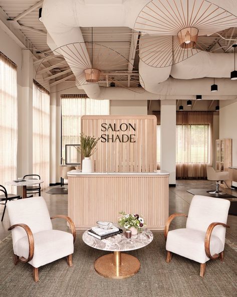 Wood Slat Wall Salon, Open Ceiling Salon, Cute Reception Desk, Open Floor Salon Ideas, Open Floor Plan Hair Salon, Salon Suites Floor Plans, Light And Airy Hair Salon, Beauty Salon Lighting Ideas, Beauty Reception Area