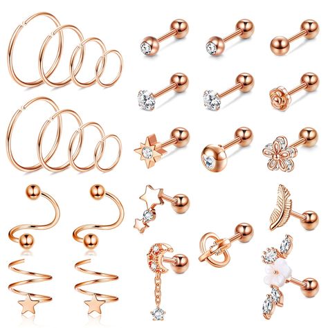 PRICES MAY VARY. MULTI STYLES: Ball, CZ, Flower, Star, Moon, Leaf, Feather, many classic and popular element designs in a set. Wear a variety of styles at the same time, bringing you a different wearing experience 26PCS: 26 pcs cartilage earring studs in a set, 14 pcs stright cartilage earrings studs+ 4 pcs helix earrings+ 8 pcs ear/nose hoops. To meet your different wearing needs, you can freely match with various styles 316L: Made of 316L Surgical Stainless Steel, Lead-Free, Nickle-Free, Cadmi Cartilage Stud Earrings, Forward Helix Earrings, Hoop Piercing, Tragus Stud, Cartilage Earrings Stud, Forward Helix, Cartilage Stud, Cartilage Earring, Helix Earrings