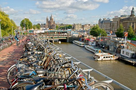 You will get the chance to stretch your legs and take in some cycling exercise with a stop-off in Amsterdam Bike Parking Lot, European Road Trip, Perth Australia, Conde Nast Traveler, World Pictures, City Bike, Bike Tour, Best Cities, Travel And Leisure