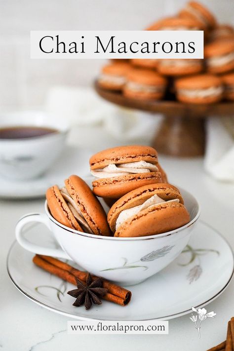 A pile of brown chai-spiced macarons in a teacup. Chai Macarons, Macaron Shop, Chai Spice Mix, Spiced Buttercream, Chai Spices, Food Cookies, Chai Recipe, French Macaron, Floral Apron