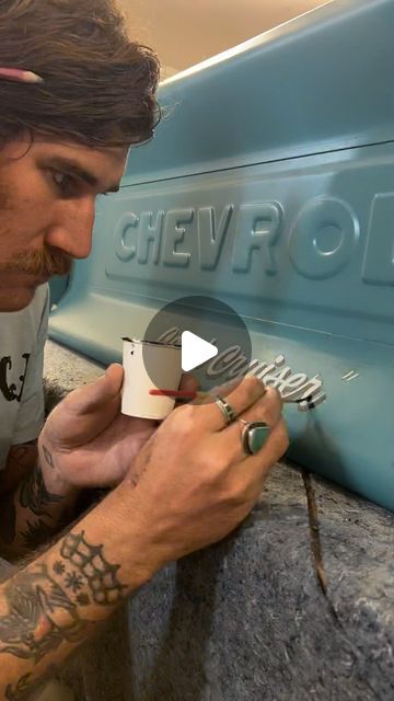 Jeff | Sun Signs on Instagram: "Tailgate lettering and another look at the doors of this ‘49 Chevy pick-up named the “Conch Cruiser” in homage to Jimmy Buffet’s truck.  Hand drawn and painted with a dry brush for an aged look using dulled down enamels.  Check out my post a couple back for more of the backstory on this project if you haven’t already. Thanks DJ for having me work on this for you!  Thank you all for having a l👀k!" Dropped Trucks Drawings, Painted Trucks On Wood, Hand Lettered Truck Door, Patina Paint Job Trucks, Old Truck Door Signs, Truck Lettering, Sun Sign, Pinstriping, Dry Brushing