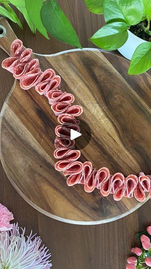 112 reactions · 15 shares | ✨Easy Salami River✨  Steps to create this at home:  1. Fold a slice of salami in half and then in half again  2. Alternate folds on a toothpick so the larger arch faces outward  3. Add 4 slices to each toothpick and combine to make it as long as you want!  Save this for later and follow along @thegratefulgraze for more easy charcuterie tricks 🤍  #salamiriver #salamistyling #charcuterietutorial #meatandcheese #charcuterieboard #charcuterie #charcuteriebox #grazingtable #cheeseboard #entertainingideas #easyentertaining #cheeseboardsofinstagram #charcuterieboardsofinstagram #cheeseboardgoals #charcuterieplatter #cheeseplate #cheeselover | Julie | Jacksonville Charcuterie | Hotel Pools · Hours Slider Charcuterie Board, Folding Salami, Charcuterie Tricks, Salami River, Square Charcuterie Board, Easy Charcuterie, Charcuterie Inspiration, Charcuterie Platter, Easy Entertaining