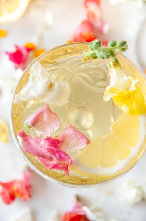 🌸🥂 Elevate your cocktail game with this exquisite Sparkling Suze Wildflower Cocktail! The perfect beverage for al fresco dining, this drink is a delightful blend of floral and citrus flavors with elderflower liqueur, a little pamplemousse, a splash of suze, and topped with a prosecco float. From aberdeenskitchen.com #sparkling #suze #wildflower #cocktail #happyhour #drink #beverage #alfresco #floral #citrus #recipe Wildflower Cocktail, Prosecco Float, Cocktail Gin, Gin Lemon, Darjeeling, Edible Flowers, Al Fresco Dining, Bday Ideas, Liqueur