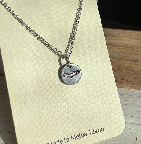 "We love to fish so of course, we needed a tiny fish necklace.  Nickel free. 16\" -18\" adjustable stainless steel silver chain. Does not fade or turn.  Disclaimer: because this is a handmade necklace, the stamping will not be exact. Each item is a little unique to itself. We will make it as close to the same as humanly possible.  Thank you so much! We sure appreciate you and your business.  Please message with any questions or concerns." Silver Fish Jewellery, Handmade Fish-shaped Jewelry Gift, Tiny Fish Necklace, Silver Fish Necklace, Sea Creature Jewelry, Sterling Silver Fish-shaped Jewelry, Tiny Fish, Fish Jewelry, Fish Necklace