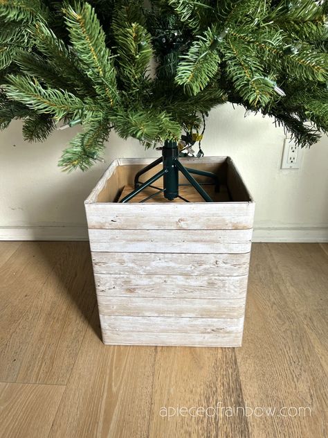 Easy $1 DIY elevated Christmas tree box stand to make a tree taller in small space home decor. Modern rustic wood planter made with cardboard! - A Piece of Rainbow, Christmas decorations, Christmas trees, home decor, holiday, hacks, boho, farmhouse, elegant, beautiful Diy Box For Christmas Tree Stand, Diy Christmas Tree Collar Wood, Elevated Christmas Tree Stand, Christmas Tree In Planter Ideas, Diy Tree Stand Christmas, How To Make Christmas Tree Taller, Make Christmas Tree Taller, Christmas Tree Box Stand Diy, Elevated Christmas Tree