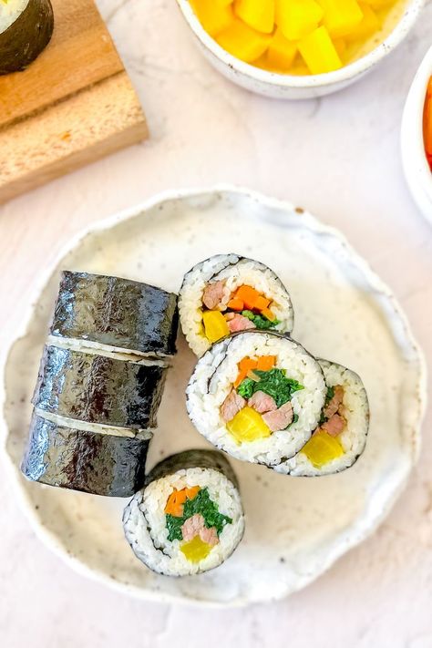 Classic Kimbap (Korean Seaweed Rice Roll) Korean Kimbap, Seaweed Rice, Rice Meat, Roasted Seaweed, Igloo Cooler, Pickled Radishes, Protein Nutrition, Packed Lunch, Marinated Beef