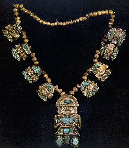 Ancient hollow gold necklace with 8 embossed   human heads with stone inlays made by the Chimu tribe in Peru