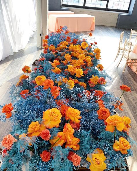 The colors in this piece 😍 can’t stop looking at this beaut from @textureflorals -“My love for orange flowers and anything-but-white linens continues. Yesterday’s sea of 🍅🍑🍊🌊 for Ada and Danny. Still can’t get over Ada’s dress and earrings!!! Thank you @feastyoureyescatering for being a pleasure to work with! It was so nice to meet you @landonwisephoto @sliceoflimephoto and have you in Philly! “ 💙🧡#thursd #thursdofficial #yourfloralmeetupspot Nicole Rossi, Orange Centerpieces, Blue Flower Arrangements, 70th Birthday Decorations, White Linens, Baby S Breath, Orange Wedding, Orange Roses, Dried Floral