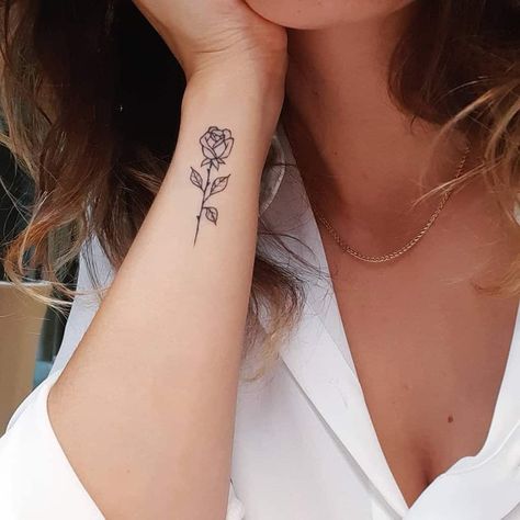 Top 51 Best Simple Rose Tattoo Ideas - [2021 Inspiration Guide] Rose Tattoo On Side, A Rose Tattoo, Simple Rose Tattoo, Small Wave Tattoo, Side Wrist Tattoos, White Rose Tattoos, Rose Hand Tattoo, Small Rose Tattoo, Shoulder Tattoos For Women