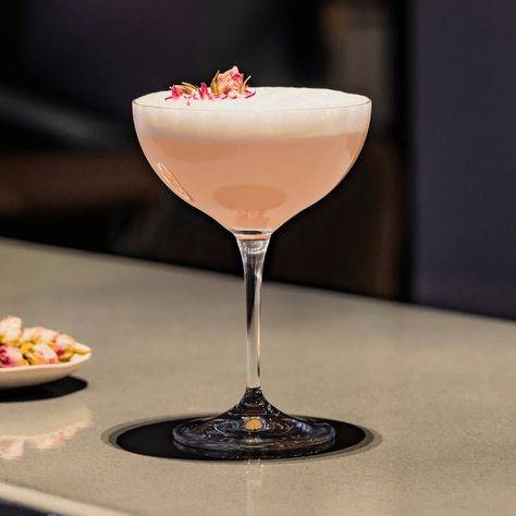 Rose and Lychee Martini Recipe | Elle Gourmet Expensive Cocktails, Lychee Martini Recipe, Rose Martini, Lychee Syrup, Lychee Cocktail, Manolo Blahnik Mules, Hotel Bars, Lychee Martini, Ultimate Chocolate Chip Cookie