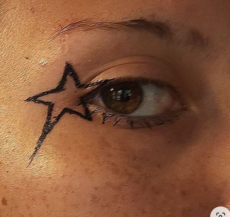 Rock Star Eyeliner, Star Shaped Eyeliner, Punk Rock Eyeliner, Punk Makeup Looks Eyes, Eyeliner Stars Makeup, Graphic Eyeliner Star, Star Makeup Eyeliner, Punk Eyeliner Men, Rock Star Eye Makeup