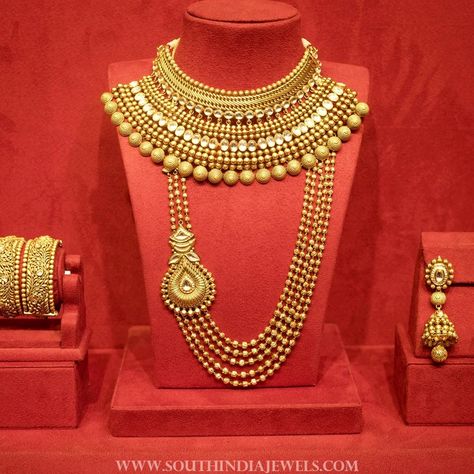 22k gold matt finish bridal jewellery set from Manubhai Jewellers. For inquiries contact details are given below. Seller Name : Manubhai Jewellers Contact No : 022 28992042 / 8 lines Website : www.manubhai.in Related PostsBridal Jewellery Collections from Manubhai JewellersWedding Jewellery Sets from Simma JewelsBridal Diamond Jewellery SetBridal Gold Coin Necklace SetGold Bridal Jewellery Set … Manubhai Jewellers, Bridal Jewellery Set, Bridal Jewelery, Gold Coin Necklace, Wedding Jewellery Collection, Bridal Fashion Jewelry, Gold Jewelry Sets, Gold Bride Jewelry, Indian Jewelry Sets