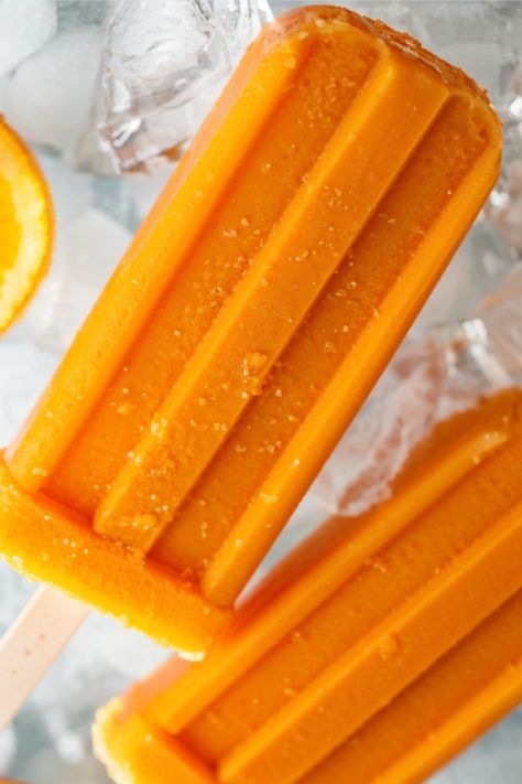 🌟 **Orange Creamsicle Popsicles** 🌟  **Ingredients:**  - 1 cup orange juice - 1 cup vanilla ice cream, softened - 1/2 cup frozen orange sherbet - 1/4 cup milk - Orange slices, for garnish (optional)  **Directions:**  1. In a medium bowl, whisk together the orange juice, softened vanilla ice cream, frozen orange sherbet, and milk until smooth. 2. Pour the mixture into popsicle molds or paper cups set in a baking sheet. 3. Insert popsicle sticks or straws. 4. Freeze for at least 4 hours, or Orange Creamsicle Aesthetic, Orange Popsicles, Orange Sherbet, Popsicle Molds, Orange Creamsicle, Cups Set, Popsicle Sticks, Paper Cups, Orange Slices