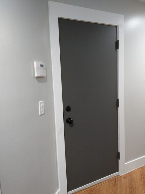 Black interior doors. Kendall Charcoal door, Repose Gray wall, white trim. #blackdoors #whitetrim #baseboards #moderbaseboards #simpledesign Gray Wall White Trim Black Door, Dark Gray Doors With White Trim, Gray Wall White Trim, White Trim Gray Walls, Grey Doors White Trim, Dark Gray Interior Doors, Charcoal Doors, Grey Walls White Trim, Gray Interior Doors