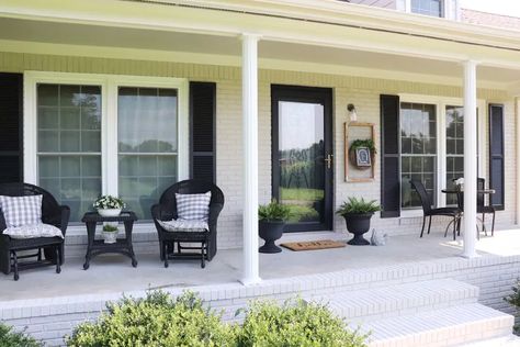 How to Make a White Garage Door Stand Out From the Pack Long Front Porch, Front Door Transformation, Veranda Design, Front Porch Furniture, Porch Design Ideas, Front Door Makeover, Black Shutters, Front Yard Design, Farmhouse Front Porches