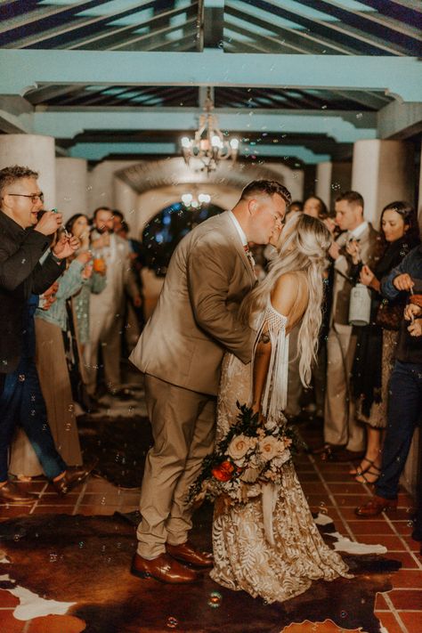 Bubble exit over cowhide rugs is the perfect boho exit for great photos Wedding Bubble Exit Night, Bubbles Ceremony Exit, Bubble Wedding Ceremony Exit, Ceremony Bubble Exit, Bubble Wedding Exit Photography, Wedding Bubbles, Wedding Exits, June Wedding, Cow Hide Rug