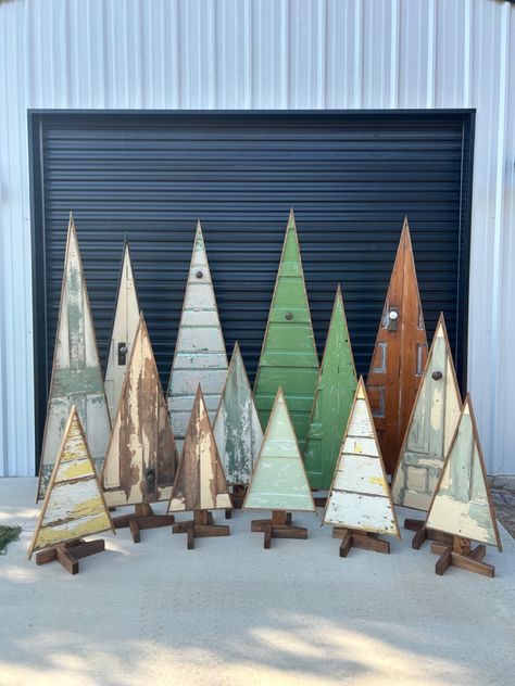 Repurposed farmhouse style doors turned to Christmas Trees 🎄 Christmas Trees Made Out Of Old Doors, Christmas Trees From Old Doors, Vintage Door Christmas Tree, Wood Door Christmas Tree, Reclaimed Wood Christmas Tree, Old Door Christmas Trees, Trees Made From Old Doors, Rustic Christmas Trees, Themed Trees