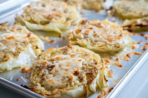 Cheesy Baked Cabbage Steaks | 12 Tomatoes Cheesy Baked Cabbage Steaks 12 Tomatoes, Cheesy Cabbage Steaks, Baked Cabbage Steaks, Cheesy Cabbage, Cabbage Dishes, Lighter Recipes, Baked Cabbage, Cabbage Steaks, Cooking Panda