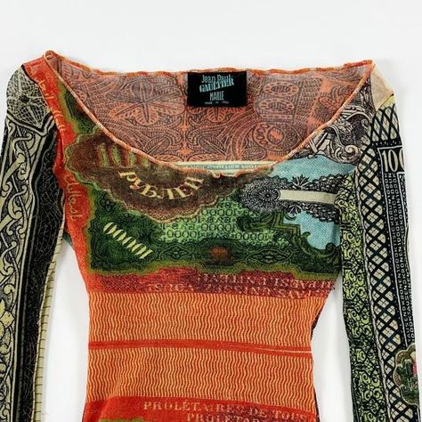 CMIYC on Instagram: "Jean Paul Gaultier SS1994 mesh longsleeve. This breathtaking top combines three of the many iconic motives from the „Les Tatouages“ runway. In a gorgeous patchwork design the front, back and sleeve each feature a different print. The edges are finished with an orange contrast stitch. Swipe through for some runway shots and a photograph by Ellen Von Unwerth capturing the collection featuring models Laetitia Casta, Vladimir McCary & Jenny Shimizu in 1994. In amazing vintage condition. Labelled M, works well for S - L. SOLD // #jeanpaulgaultier #gaultier #gaultierforever #jeanpaulgaultiervintage #gaultiervintage //" Jenny Shimizu, Thrift Manifestation, Infinite Money, Ellen Von Unwerth, Laetitia Casta, Lovely Clothes, Jean Top, Paul Gaultier, Spring Style