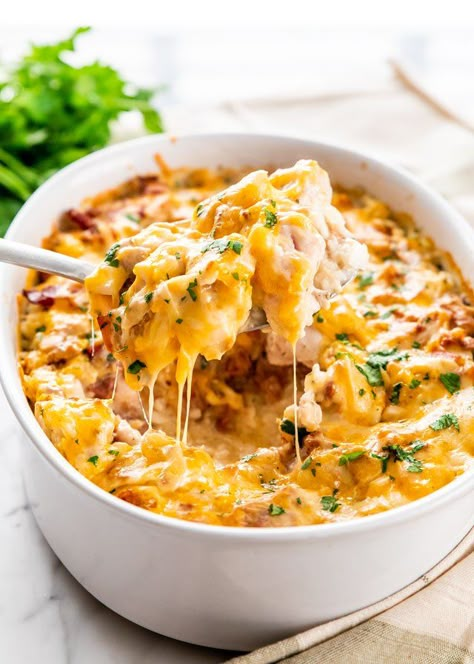 This Chicken Bacon Ranch Casserole is your answer to a busy weeknight dinner. We're talking creamy, cheesy rice casserole loaded with Ranch chicken and bacon! #casserole #chickenranchcasserole Slow Cooker Chicken Bacon Ranch, Chicken Bacon Casserole, Loaded Chicken And Potatoes, Bacon Ranch Casserole, Top Dinner Recipes, Cheesy Chicken Casserole, Ranch Casserole, Bacon Casserole, Dinner Casserole Recipes