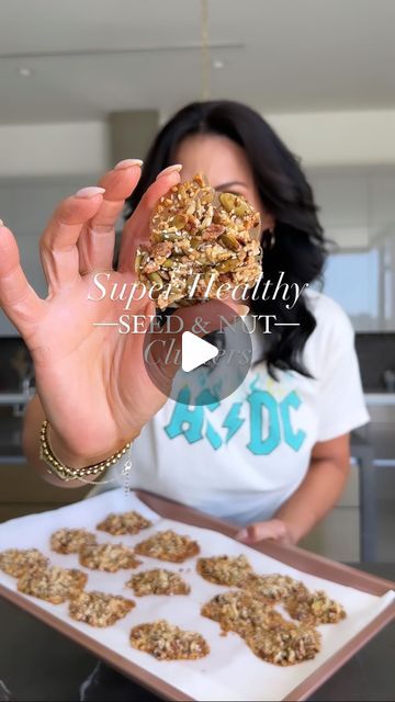 Sivan's Kitchen on Instagram: "Super healthy seed and nut clusters with no refined sugar and vegan !! Basically it’s just any seeds and assorted nuts that you like with a little maple syrup and coconut oil, that’s it !!! UNREAL 🤯
I like to use some salted nuts for the sweet and salty combo, but you can definitely use all raw nuts and seeds if you prefer. 
Recipe yields about 15 cookies. 

Ingredients:
•1/4 cup (37 grams) slivered almonds 
•1/4 cup (34 grams) crushed pecans 
•1/4 cup (39 grams) crushed salted almonds 
•1/4 cup (30 grams) salted roasted sunflower seeds 
•1/4 cup (39 grams) salted roasted pumpkin seeds
•2 tbsp. (20 grams) raw sesame seeds
•1/4 cup (59 ml.) maple syrup 
•1 tbsp. (14 ml.) coconut oil 
Option: 
1. The cookies can also be half dipped in chocolate or add a chocol Keto Nut And Seed Clusters, Fridge Healthy, Nut Cluster Recipe, Sivan's Kitchen, 15 Cookies, Roasted Sunflower Seeds, Sesame Seeds Recipes, Salted Almonds, Nut Clusters