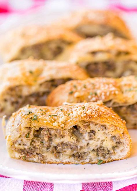 Sausage Bread - SO good! We ate this for lunch two days in a row! Easy and delicious! Great for parties and an easy lunch/dinner. Serve with warm sauce. Refrigerated pizza dough stuffed with sausage, onion, fennel, dijon mustard, egg, mozzarella cheese, butter, Italian seasoning, and parmesan. Can make ahead of time and reheat. #pizza #bread #appetizer #sausage #dinner Sausage Bread Recipe, Refrigerated Pizza Dough, Sausage Bread, Cheese Butter, Sausage Rolls, Football Food, Easy Lunch, How To Cook Sausage, French Bread