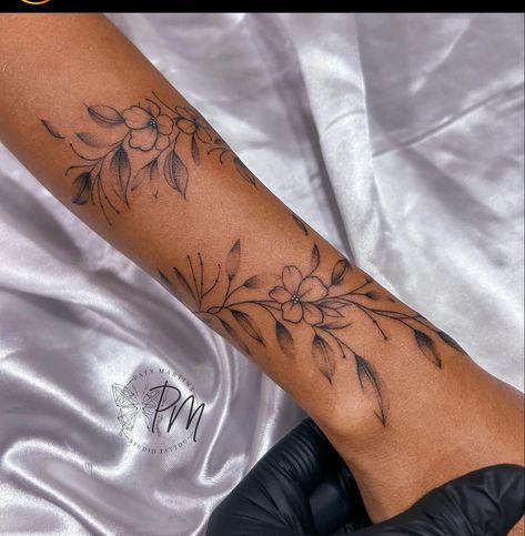 Wrapped Wrist Tattoo, Women Arm Tattoo Classy, Lily Wrist Tattoo, Wrap Around Flower Tattoo Arm, Wrist Wrap Tattoos For Women, Independence Tattoo, Wrap Around Forearm Tattoo Women, Flower Wrap Around Tattoo, Tiger Lily Tattoos