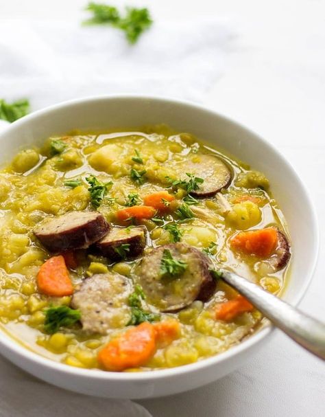 Easy and comforting Split Pea Soup will fill your kitchen with warm and delicious flavors! Made with healthy split peas, bacon and kielbasa, this traditional Dutch recipe is cozy and great for dinner for the whole family. You won't be disappointed. #lavenderandmacarons #soups Dutch Pea Soup Recipe, Dutch Soup, Traditional Dutch Recipes, Bisque Soup Recipes, Dutch Cuisine, Hearty Soup Recipes, Split Pea Soup Recipe, Split Peas, Pork Soup