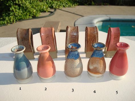 Coyote glaze testing. Front row: Cone 6 white porcelain slip cast vases. Back row: Aardvark buff cone 6 clay test forms. 1. Gun Metal Green over Smokey Shino 2. Gun Metal Green over Sunrise Shino 3. Croc Blue over Sandstone Shino 4. Croc Blue over Mocha Shino 5. Gun Metal Green over Cedar Shino Coyote Glazes, Spectrum Glazes, Nice Man, Ceramic Glaze Recipes, Back Row, Glazed Tiles, Ceramic Techniques, Surface Decoration, White Pottery