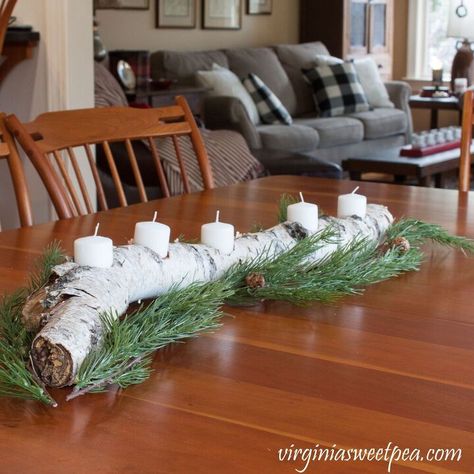 Grab a branch or log from the woods and use it to make a DIY Yule Log to use as a centerpiece on your dining room table, kitchen table, or your coffee table. I use mine all winter! Get more ideas for DIYs, crafts, and home decor on my blog, Sweet Pea. I live in Virginia where Birch trees do not grow but my friend visited Michigan and brought this Birch branch back to me because she knew that I would enjoy making something with it.If you don't have a Birch tree, any thick branch from… White Birch Logs Decor, Diy Yule Log, Birch Projects, Log Decorations, Yule Feast, Taper Candle Centerpiece, Birch Tree Decor, Yule Crafts, Birch Candles