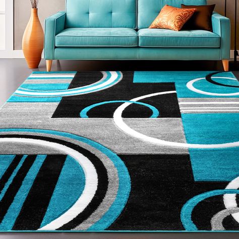 PRICES MAY VARY. Contemporary Style for Modern Homes: 6x9 (6'7" x 9'3") rug perfect for the contemporary homeowner, our rugs feature oversized geometric prints and abstract designs that seamlessly blend with modern aesthetics. Modern styling, expert craftsmanship and easy maintenance come together in this contemporary area rug. Made from soft air twisted polypropylene yarns which gives this contemporary rug a unique look and feel. You'll definitely appreciate it's plush 12mm pile. It's stain res Turquoise Living Room, Turquoise Living Room Decor, Gold Floor Lamp, Target Rug, Well Woven, Abstract Geometric Pattern, Blue Colour Palette, Carved Designs, 8x10 Area Rugs