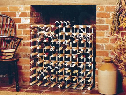 Winerack in fireplace Empty Fireplace Ideas, Custom Wine Rack, Unused Fireplace, Tours France, Wine Rack Storage, Storage Racks, Diy Wine Rack, Flat Shapes, Home Fireplace