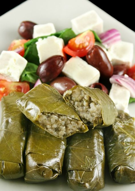 Delicious Vegetarian Dolmades Dolmas Recipe Greek, Grape Leaf Recipes, Dolmades Recipe, Grape Leaves Recipe, Traditional Greek Salad, Raisin Muffins, Greek Appetizers, Stuffed Grape Leaves, Frozen Grapes