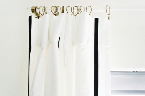 Lucite drapery rod, white curtain panels hung with warm gold curtain clips in a master bedroom. Ribbon Curtain, Nightstand Lighting, Curtain Clips, Gold Curtains, Drapery Rods, Blogger Design, White Curtains, Basic Shower Curtain, Clip Ins