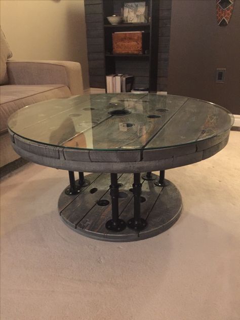 Grey hydro spool coffee table with black steel pipe legs Wood Spool Coffee Table, Spool High Top Table, Spring Wood Projects, Wood Spool Ideas, Spool Coffee Table, Wire Spool Ideas, Cable Spool Ideas, Wood Spool Tables, Wooden Spool Ideas