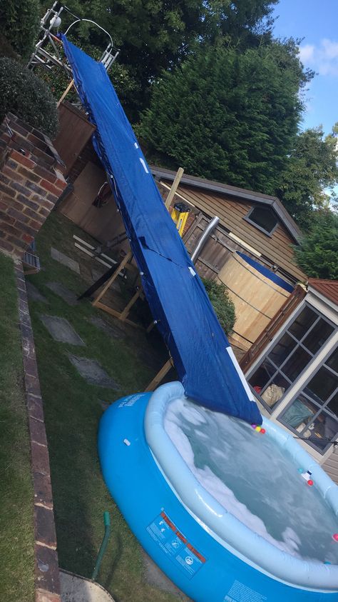 Homemade Water Slide, Pool Slide Diy, Pool Ideas Above Ground, Backyard Water Parks, Sloped Yard, Above Ground Pool Ideas, Small Yards, Ground Pool Ideas, Diy Swimming Pool