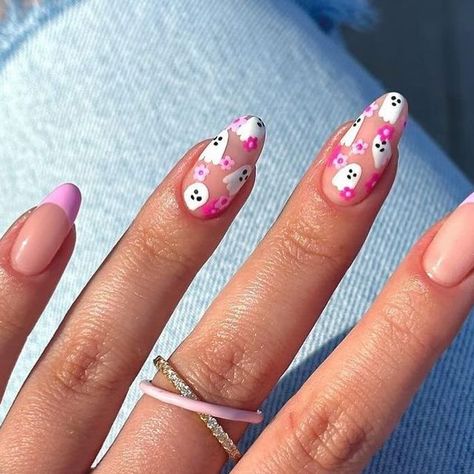 Abi Markey on Instagram: "The cutest floral ghost mani 🥹👻🌸  I love making Halloween cute ! Remember when I got a load of hate on TikTok for creating pink Halloween nail designs lol soz not soz x  Created using @homeofnailart  Delight, Taffy, White and Black 🎨   @officialnavyprofessional nail prep ABI15 💓  . ——————- #halloweennails #floralghost #ghostnails #halloweennailart #autumnnails #HONA #navypro #showscratch #pinknails #frenchmani #floralnails #biab #cutehalloween #pinkhalloween #nailsofig #cutenails #ghosts #floralnailart #nailsoftheday" Ghosts On Nails, Pink Ghosts Nails, Ghost Nails Pink, Halloween Biab Nails, Pink Halloween Nail Designs, Pink Ghost Nails, Cute Ghost Nails, Ghost Nails, Girly Tingz