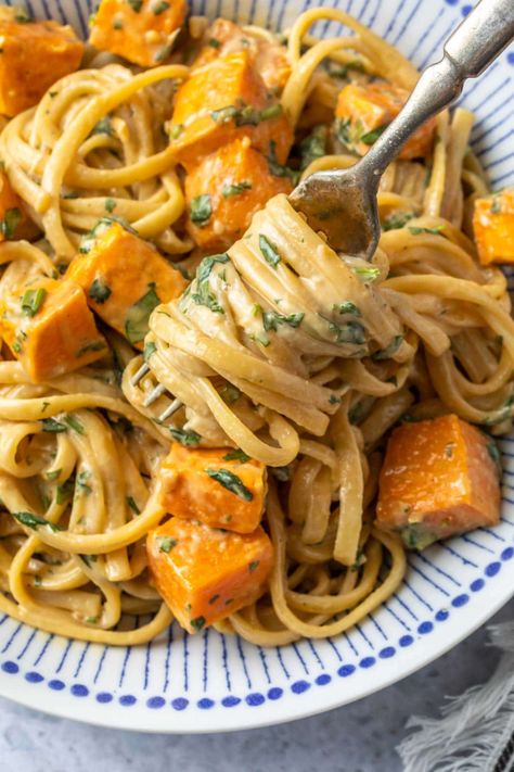 This easy, vegan sweet potato pasta features roasted sweet potatoes and linguini noodles tossed in a creamy, cilantro tahini sauce. This recipe is super easy to make and it’s perfect for fall! Sweet Potato Pasta Recipe, Sweet Potato Pasta Sauce, Sweet Pasta, Roasted Recipes, Simply Whisked, Sweet Potato Sauce, Sweet Potato Pasta, Potato Noodles, Favorite Pasta Recipes