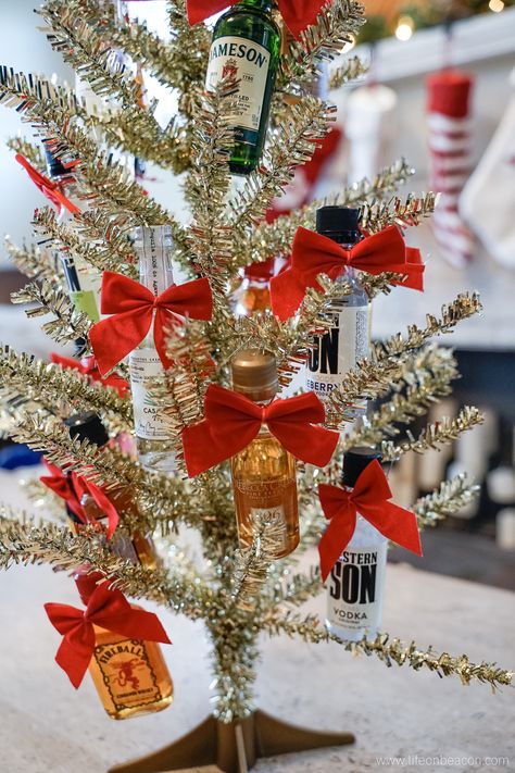 Mini Liquor Bottle Christmas Tree | Life on Beacon Mini Liquor Bottle Christmas Tree, Liquor Bottle Gift Ideas, Mini Liquor Bottle Gift Ideas, Mini Alcohol Bottles Gifts, Bottle Gift Ideas, Alcohol Bouquet, Bottle Christmas Tree, Liquor Gift Baskets, Mini Alcohol Bottles