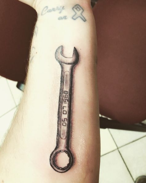 Wrench tattoo Wrench Finger Tattoo, Tattoo Tools Mechanic, Memorial Wrench Tattoo, Mechanic Memorial Tattoo, Wrench Tattoo Design, Wrench Tattoo Mechanic, Mechanic Tattoo For Men, Tool Tattoo Mechanic, Mechanic Tattoo Ideas