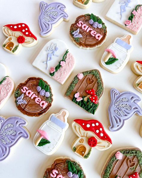 🧚‍♀️ A sweet little fairy is on her way!✨… | Instagram Enchanted Forest Cookies Decorated, A Little Fairy Is On Her Way, Fairy Gender Reveal, Enchanted Forest Cookies, Fairy Garden Cookies, Fairy Garden Baby Shower Ideas, Reading Hideaway, Fairy Cookies, Princess Party Food