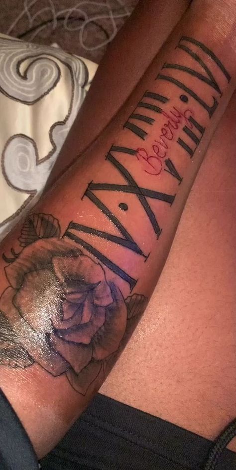 Roman Numeral Tattoos Arm, Name Remembrance Tattoos, Cute Name Tattoos Husband, Foreman Tattoo For Women, Mom Tattoo For Men Forearm, Forearm Tattoos Roman Numerals, Name And Roman Numeral Tattoo, Memorial Name Tattoos, Moms Name Tattoo Ideas