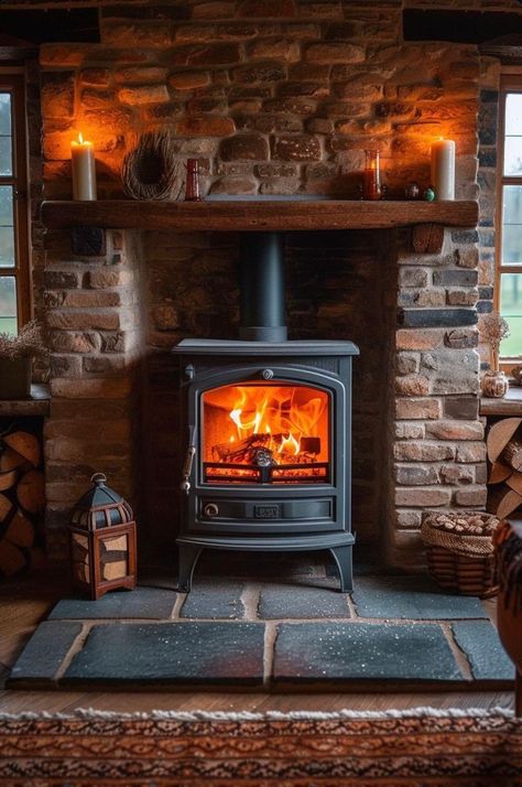 Wood Burning Stove Brick Wall, Wood Stove With Stone Surround, Wood Stove In Middle Of Room, Wood Stove Surrounds, Wood Stove Nook, Woodstoves In Living Rooms, Wood Stove Stone Wall, Brick Wood Stove Surround, Wood Burning Stove With Mantle