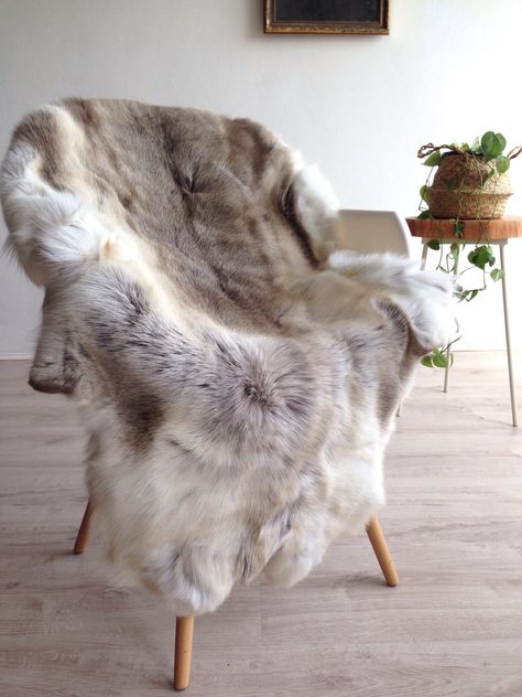 Reindeer Hide Decor, Animal Hide Decor Ideas, Fur Rug Decor, Animal Hide Decor, Animal Hide Rug, Comfy Apartment, Reindeer Hide, Fluffy Chair, Tv Nook